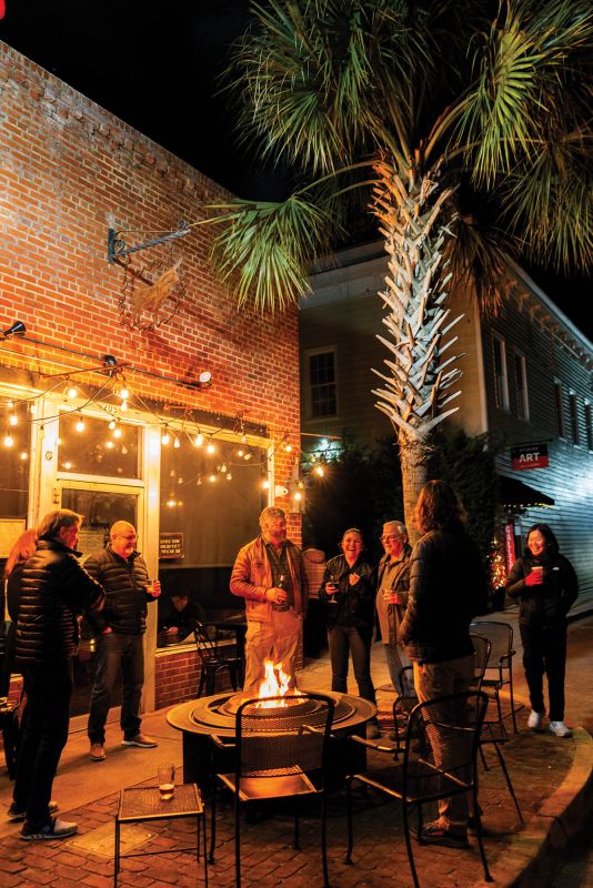 Friday nights bustle at Old Bull Tavern, a popular spot for fireside gatherings, as well as wood-fired pizzas and house-made pastas.