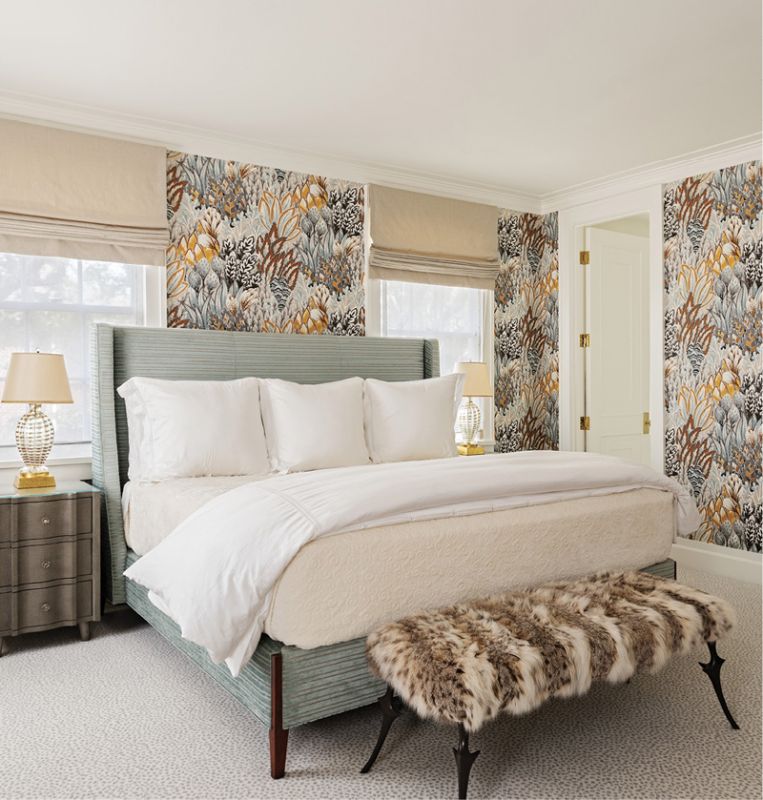 A fur-covered Sabot ottoman from Formations continues the animal theme, while the bed’s pale green fabric from Osborne & Little softens the effect.