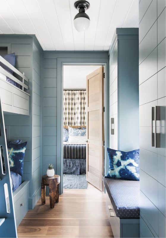 Custom bunk beds by William C. Pritchard Co., painted in Farrow & Ball’s “Inchyra Blue.”
