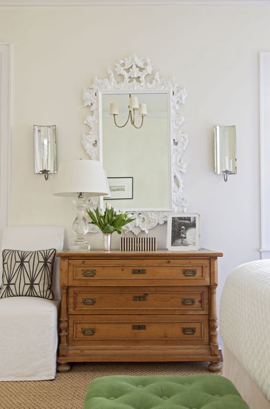 Inspired by views of the adjacent nature preserve, Allison used vibrant green fabrics to upholster a headboard and bench for the master bedroom.