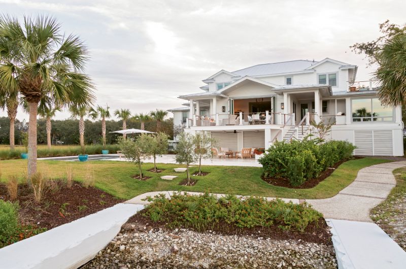 Sitting Pretty: Just steps from Shem Creek, the McElveens found the ideal location, but not the perfect property. So the couple embarked upon a complete renovation, stripping away ‘90s embellishments, such as ornate columns and a two-story foyer, to create a modern yet timeless architectural style.