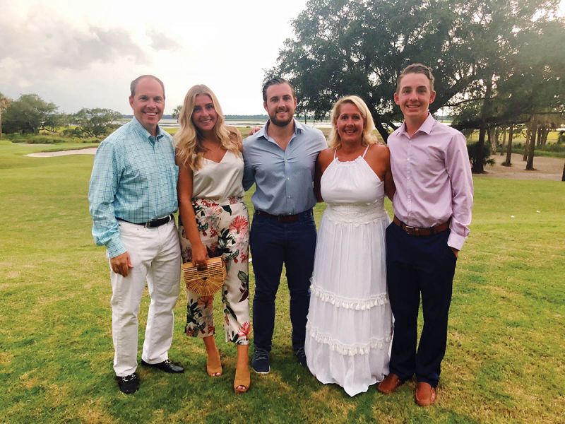Frank and Noreen Britt with their daughter, Lexi (second from left), and sons, Tyler (middle) and Clayton (right). The children fell in love with Kiawah when they first visited 13 years ago, prompting their parents to put down roots here.