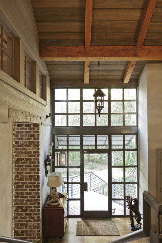 The glass entry aims to look like a new addition linking two old buildings.
