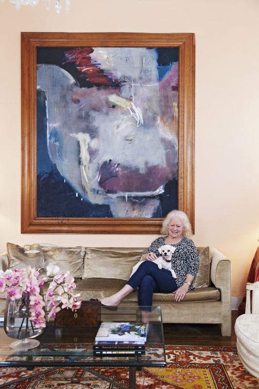 Bigner and her shelter pup, Charlie, in the parlor