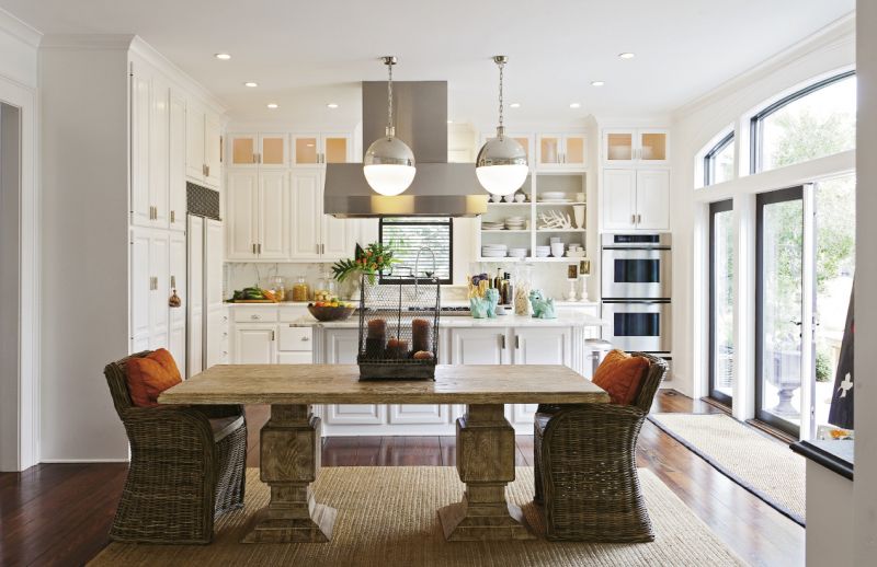“Painting the window frames a contrasting color really draws the focus outdoors, to the botanicals and  the marsh.”