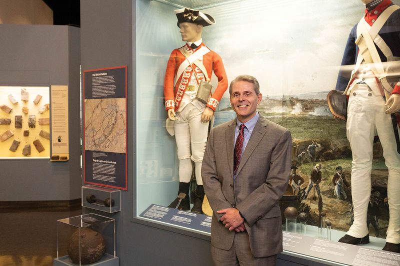 The Charleston Museum director Carl Borick near the “Becoming Americans: Charleston in the Revolution” permanent exhibit