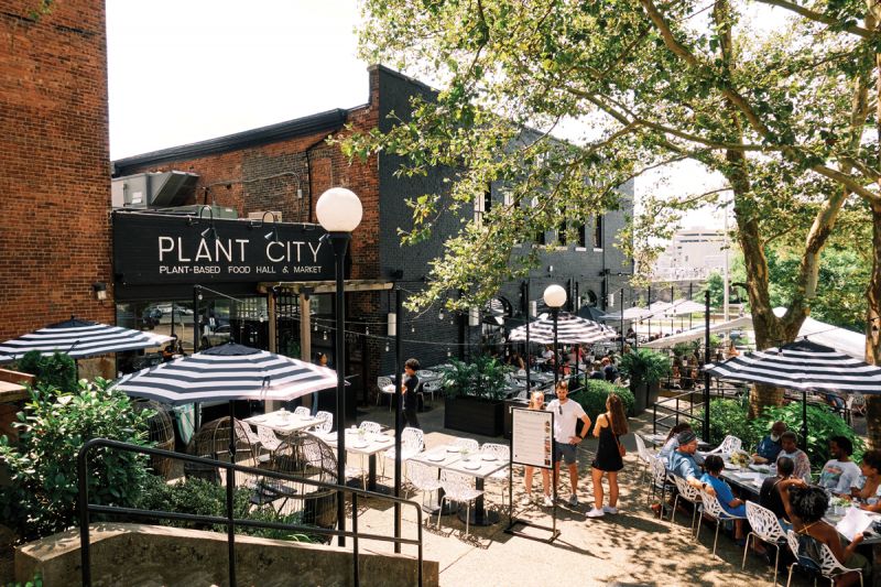 Patio seating in the courtyard of Providence’s plant-based food hall, Plant City.