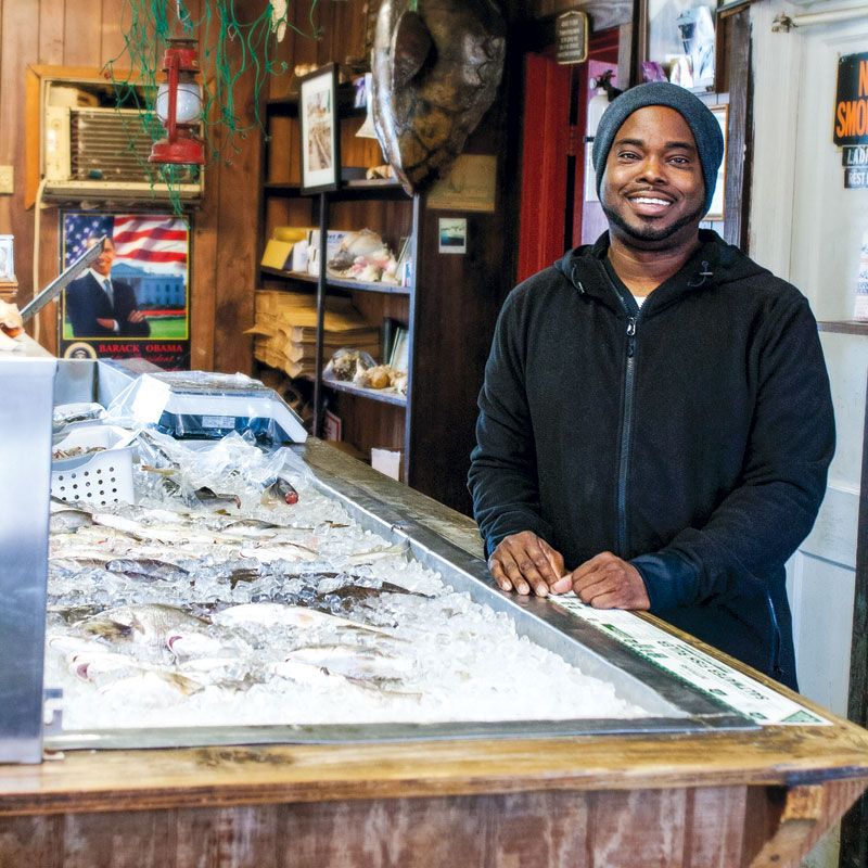 Chef BJ Dennis at his friends’ Sol Legare establishment, Backman’s Seafood