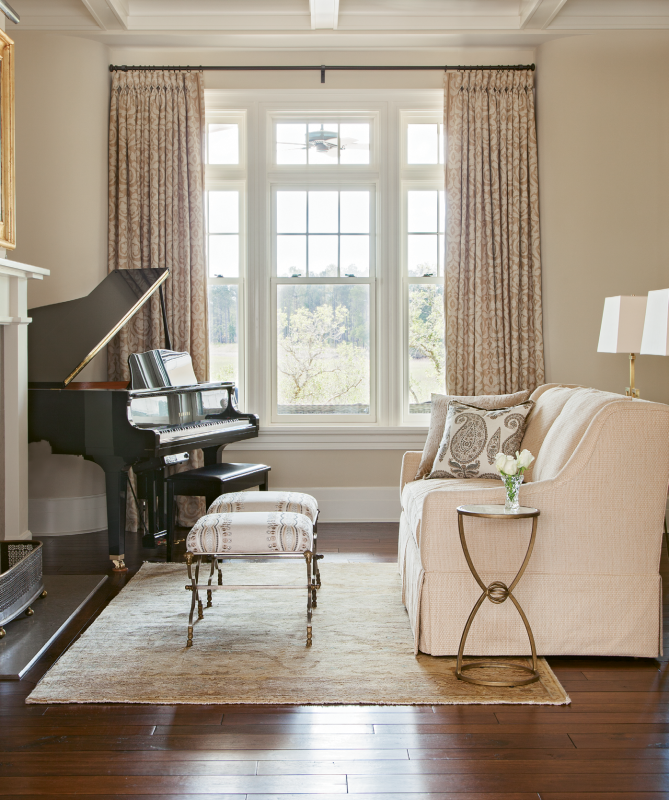 in harmony:  The Lyles spotted these ottomans for the music room on a trip to the Atlanta Decorative Arts Center, then had them covered in an embroidered fabric by Zimmer + Rohde.