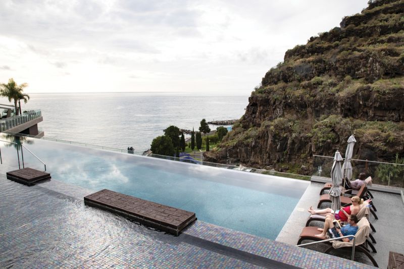 Saccharum Resort & Spa, another Savoy Signature property, overlooks the coast near Calheta.