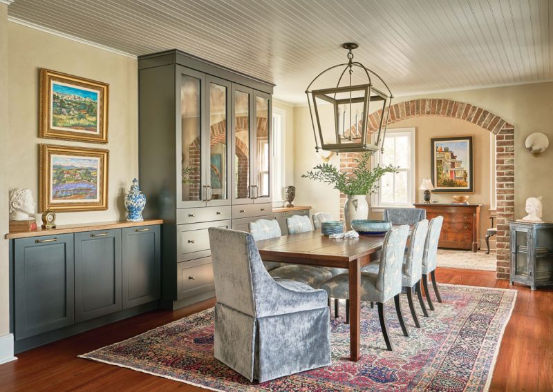 The living and dining rooms and entryway comprise much of the original cottage, along with three bedrooms upstairs.