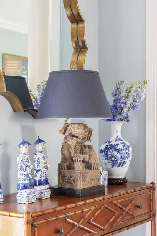 A carved mahogany console table from Bebe & Lenox showcases Peggy’s collection of blue and white porcelain.