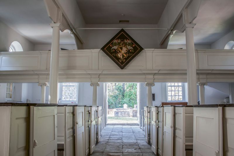 St. James' Goose Creek: Among the interior wall decorations is the funerary hatchment with the coat of arms of the Izard family. Following the English custom, after the head of a family was buried the panel was hung in the church.