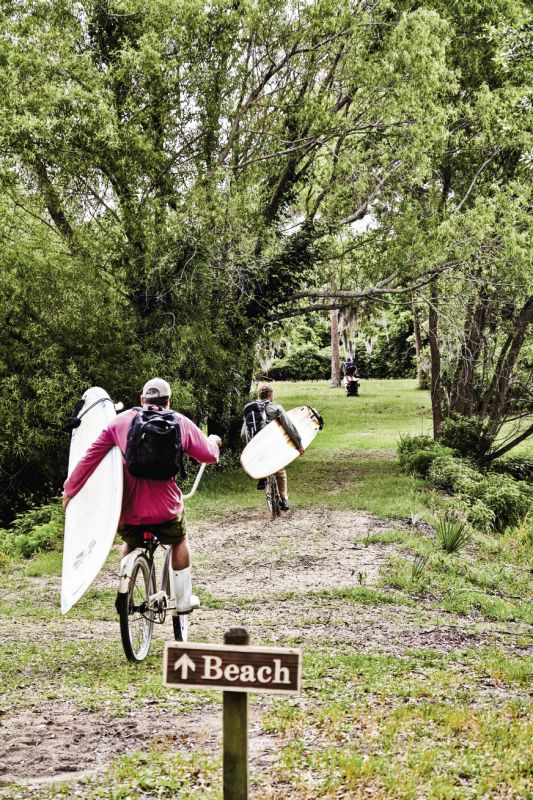 “Pirate” Pete Kornack follows on the path to the beach.