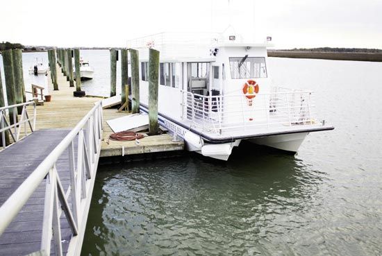 After boarding the Dewees Island Ferry, life decelerates to a pleasant, sea-breezy pace.