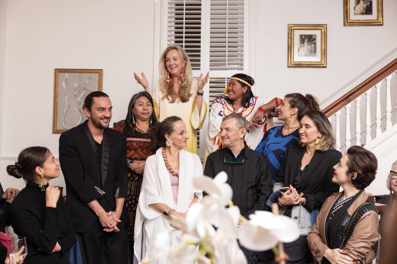 Walker with the visiting Colombian luminaries at the home of board member Amanda Flynn.