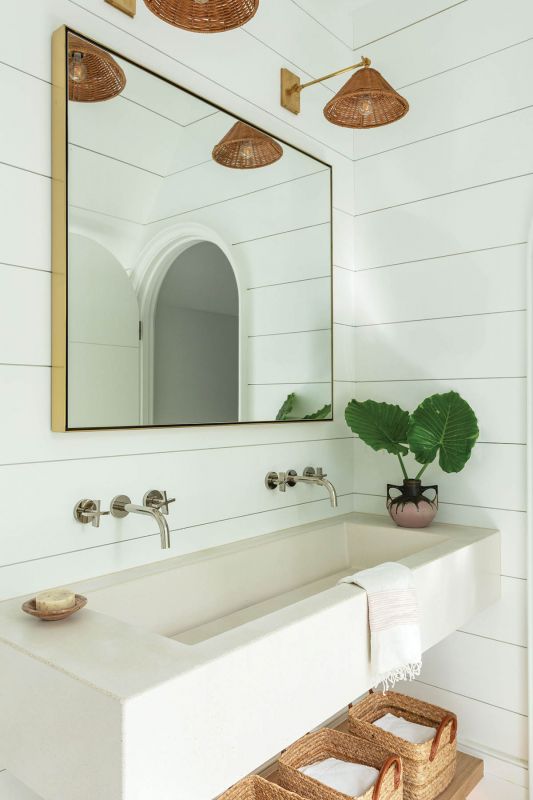 A concrete trough sink in the bunk room bath