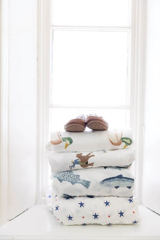 Connelly translates her artwork into wallpaper and bedding, including crib sheets and shams.