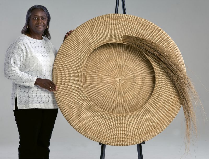 One & Done: Commissioned by a patron who later donated it to the Gibbes, Jackson’s Never Again (2007, sweetgrass and palmetto, 42 inches) took three years of intricate work. A masterpiece of craft, the shape harkens back to the traditional flat rice baskets, but takes it to a soaring new level.