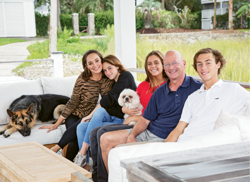 The whole family, including pups Murphy and Sugar, in the gazebo