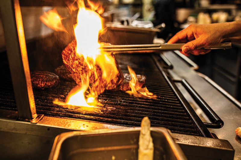Turning Up the Heat: Oak pioneered fine dining on Broad Street, converting a two-story bank into handsome dining spaces and offering prime dry-aged steaks and seafood specialties.
