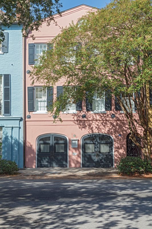 Pretty in Pink: The home required minimal renovation for the couple and their 13-year-old son to move in late last year. A fresh coat of “Damask Rose” from the Sherwin-Williams Historic Charleston Collection for the exterior and some colorful updates on the interior helped breathe new life into the centuries-old residence.