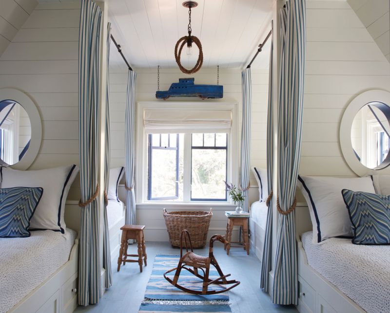 Personal Space: The additional bedrooms each have a distinct personality. The charming bunk room, which can sleep eight on its full beds, is a playful space, its shiplapped bunks, portholes, and pretty Brunschwig & Fils pillows creating a nautical vibe.