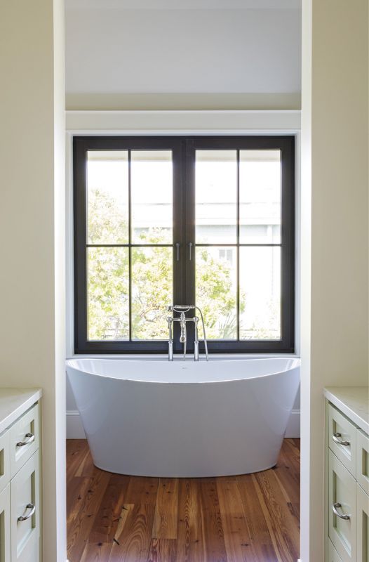 The en-suite bath features a glorious soaking tub.