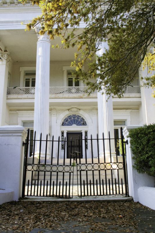Before: Although it had been boarded up for more than a decade, the house was “extraordinarily sound, stable,” according to architect Eddie Fava, “as its entire structural core was massive solid masonry.”  PHOTOGRAPHS BY KRISTIN WALKER, COURTESY OF CHARLESTONINSIDEOUT.NET