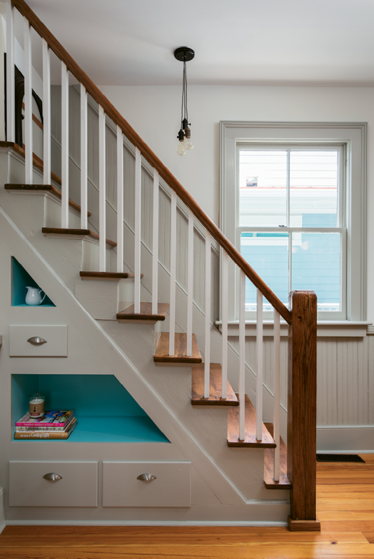 The former service stairs now function as an interesting focal point in the kitchen, as well as a fun play space for visiting grandchildren.