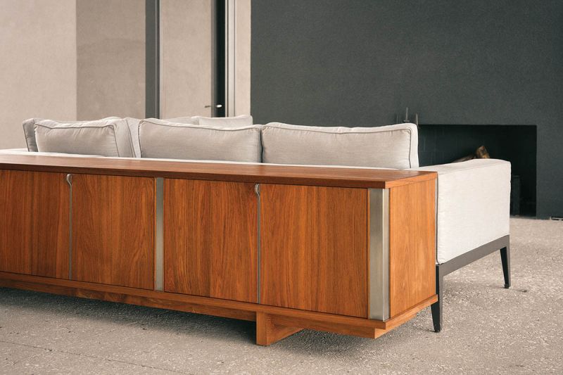 “Estate” credenza designed by Benjamin Paul Studio in teak and stainless steel