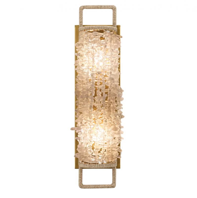 Lighting includes  wall sconces, from the sleek, glass “Thomas” to beaded styles, as well as intricately woven pendants