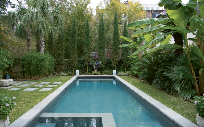Calm & Cool: The garden’s final room conjures the Mediterranean with an all-green landscape that mingles Italian cypress trees, Confederate jasmine, variegated flax lily, sago palms, and banana trees.