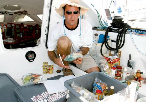 Kurt Oberle of High & Dry Boat Works organizes provisions. Photographs by Billy Black.